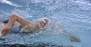 A female swimmer at an indoor swimming pool in Wichita, KS